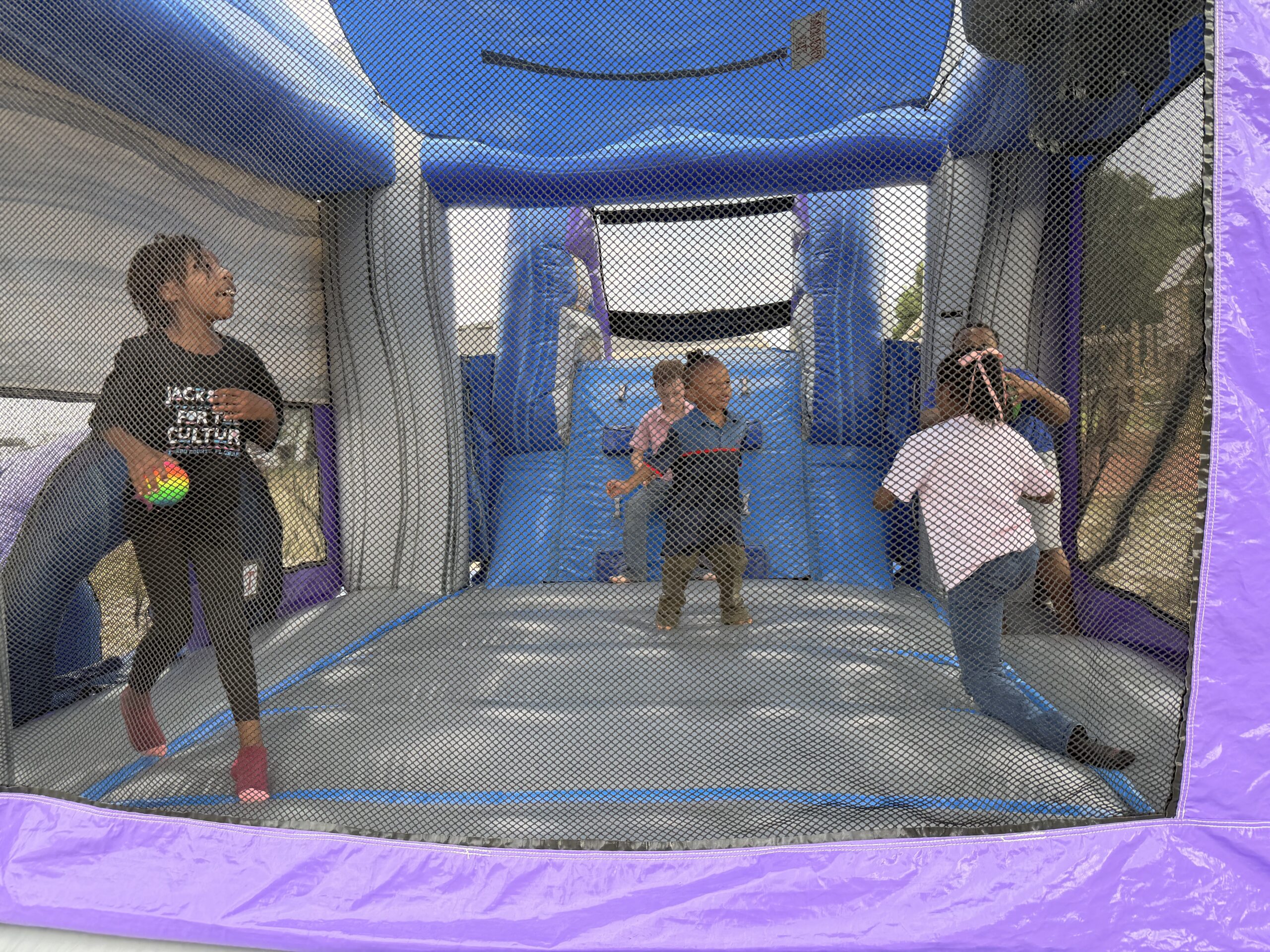 Children enjoying safe play in a bounce house at Helen’s House in Melbourne Florida