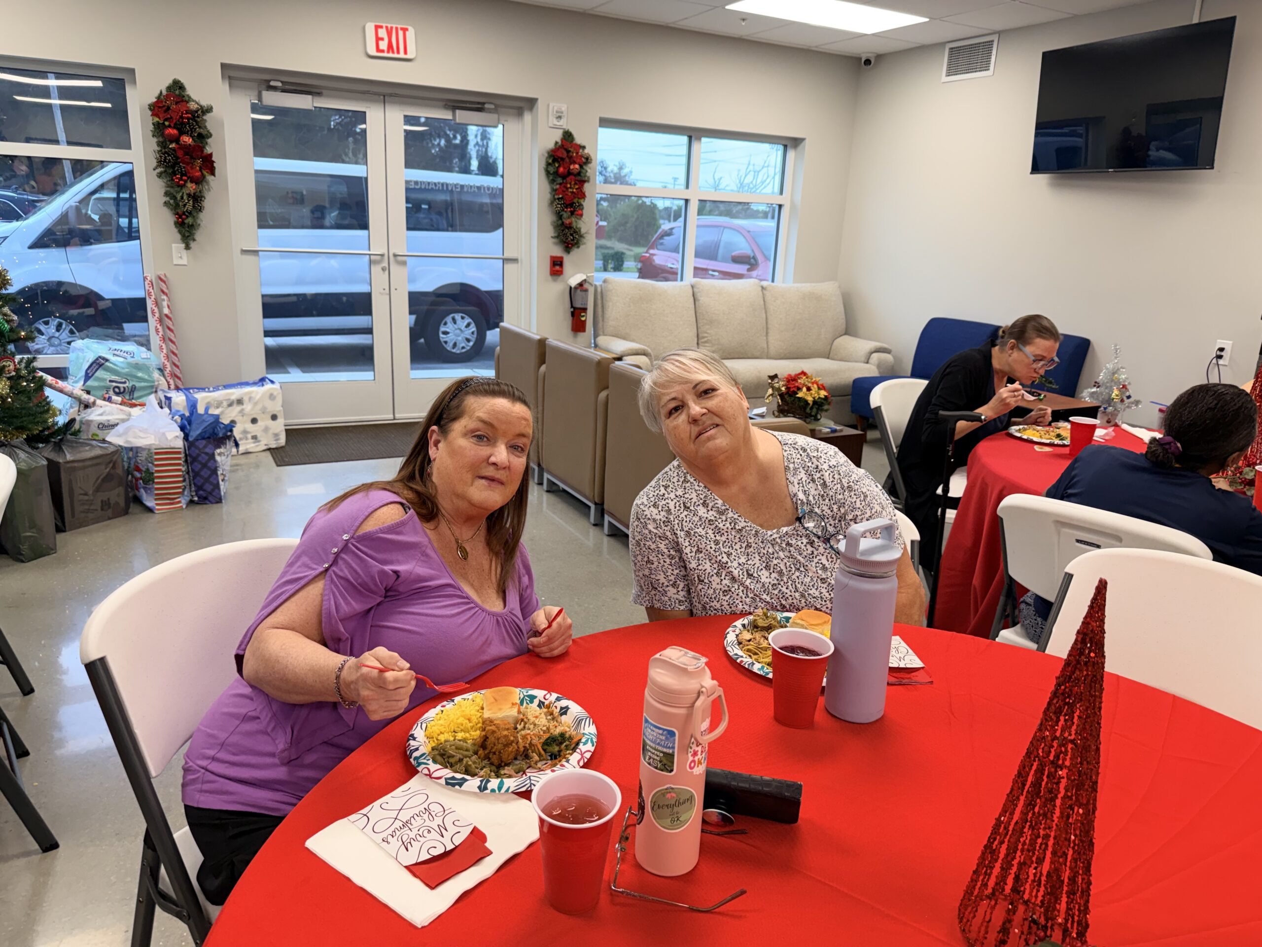 Women gathered for a meal inside Helen’s House at CITA Rescue Mission Women and Children’s Center in Melbourne Florida