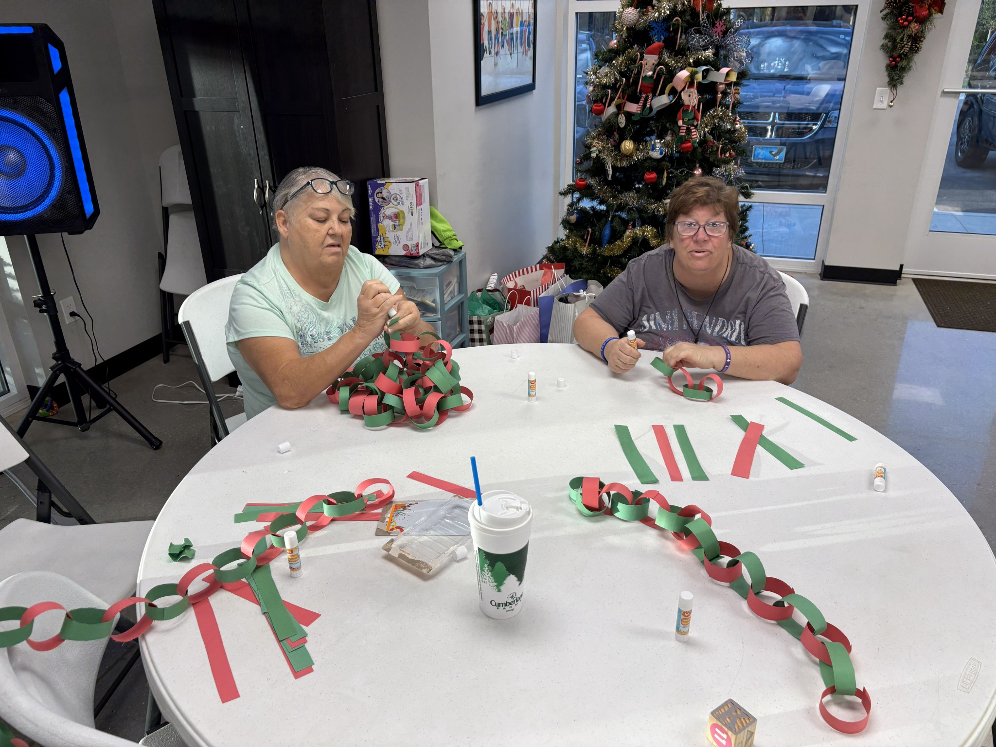 Women participating in a community craft activity at Helen’s House Women and Children’s Center in Melbourne Florida