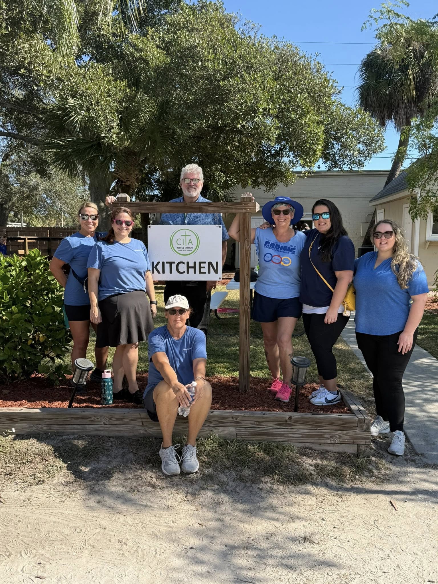 Group volunteers outside the CITA Rescue Mission kitchen in Melbourne, Florida