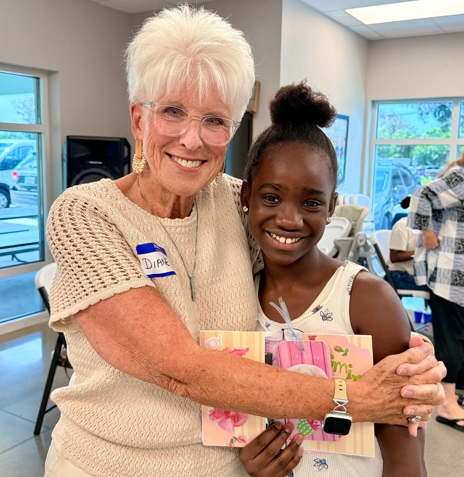 Sharing encouragement and care with a child at Helen's House