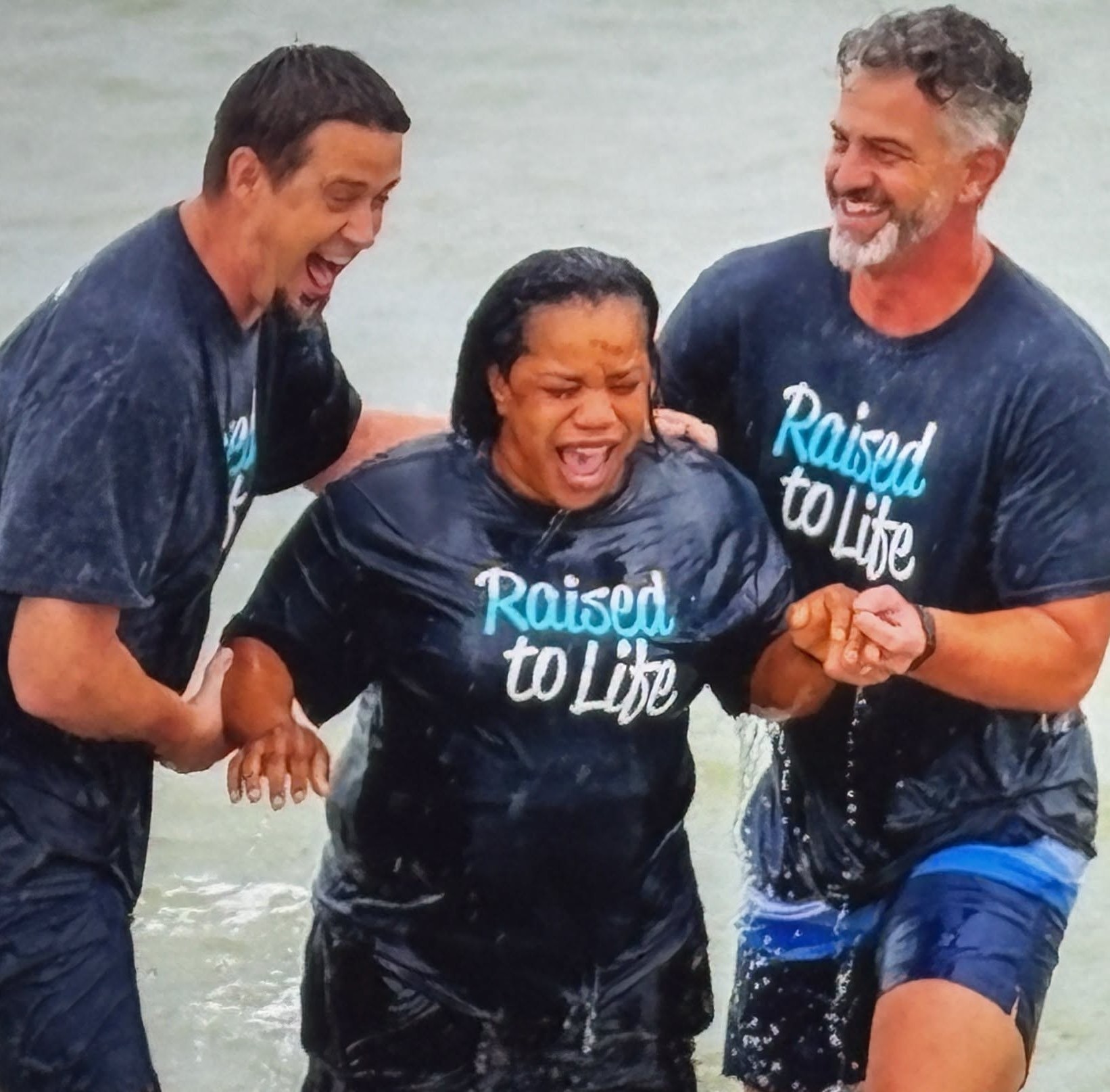 Helen’s House resident being baptized