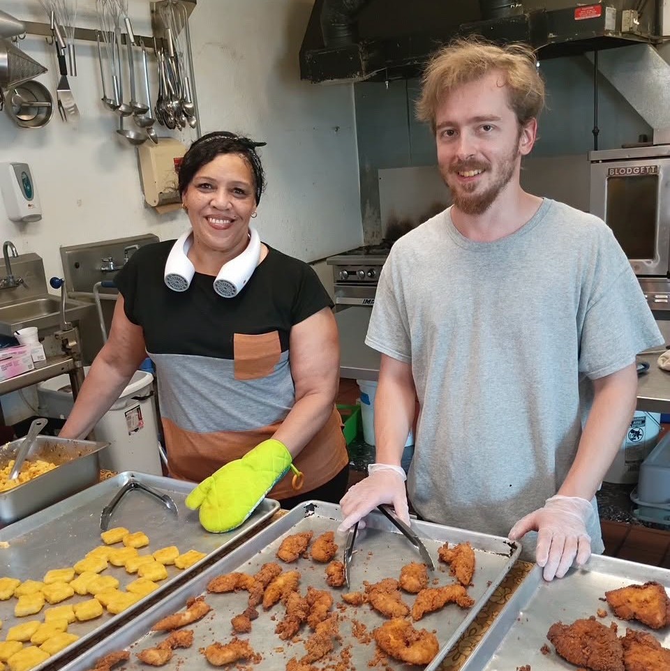 Volunteer Odessa serving in the Men’s Campus kitchen