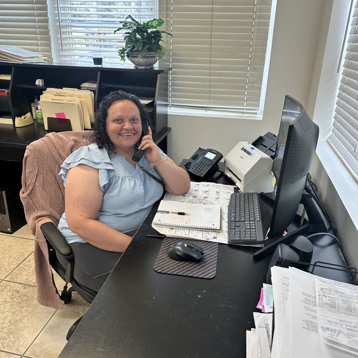 Christina serving in the Christ Is The Answer Rescue Mission administrative office